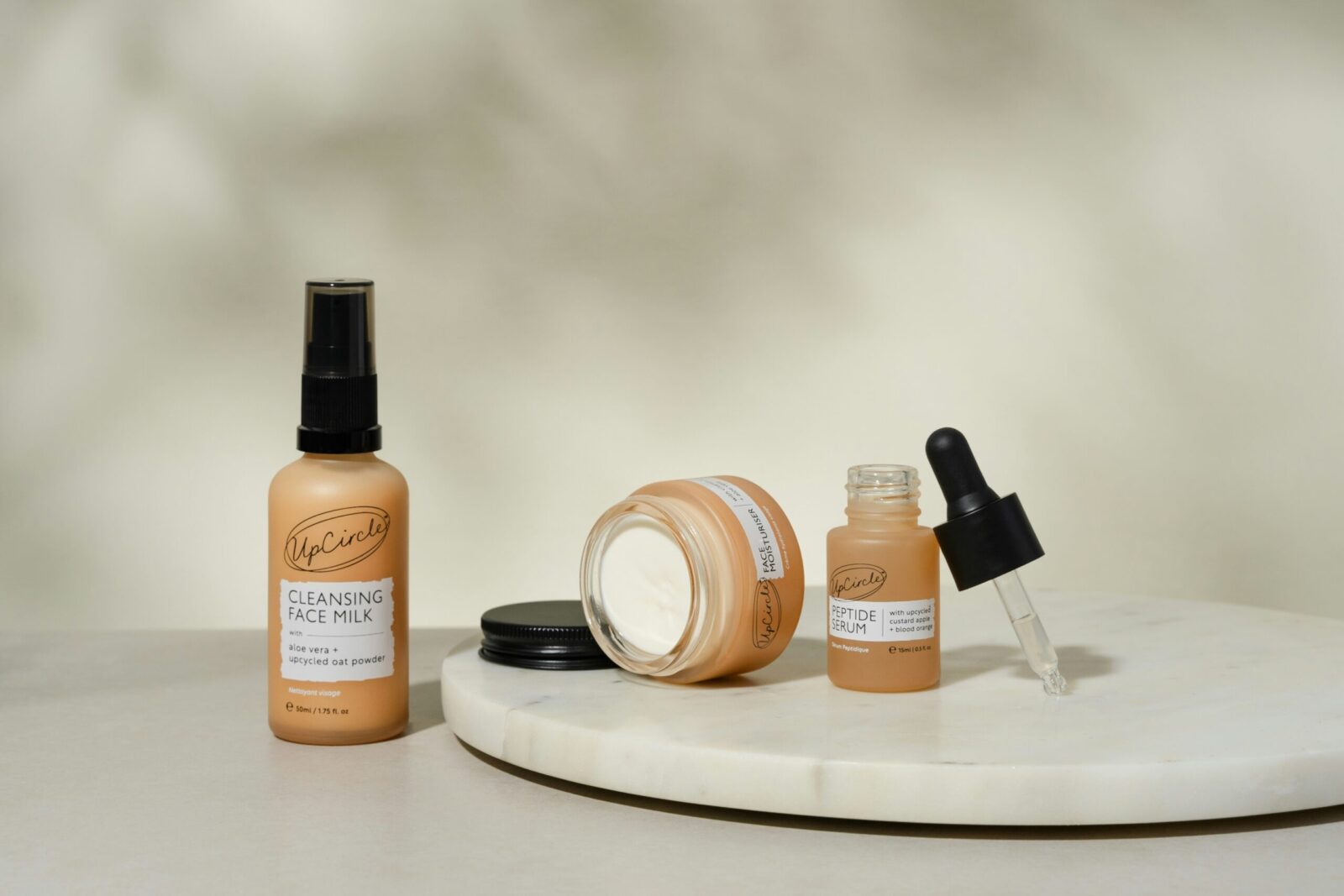 Luxury skincare serums and creams flatlay – essential skincare ingredients 2025